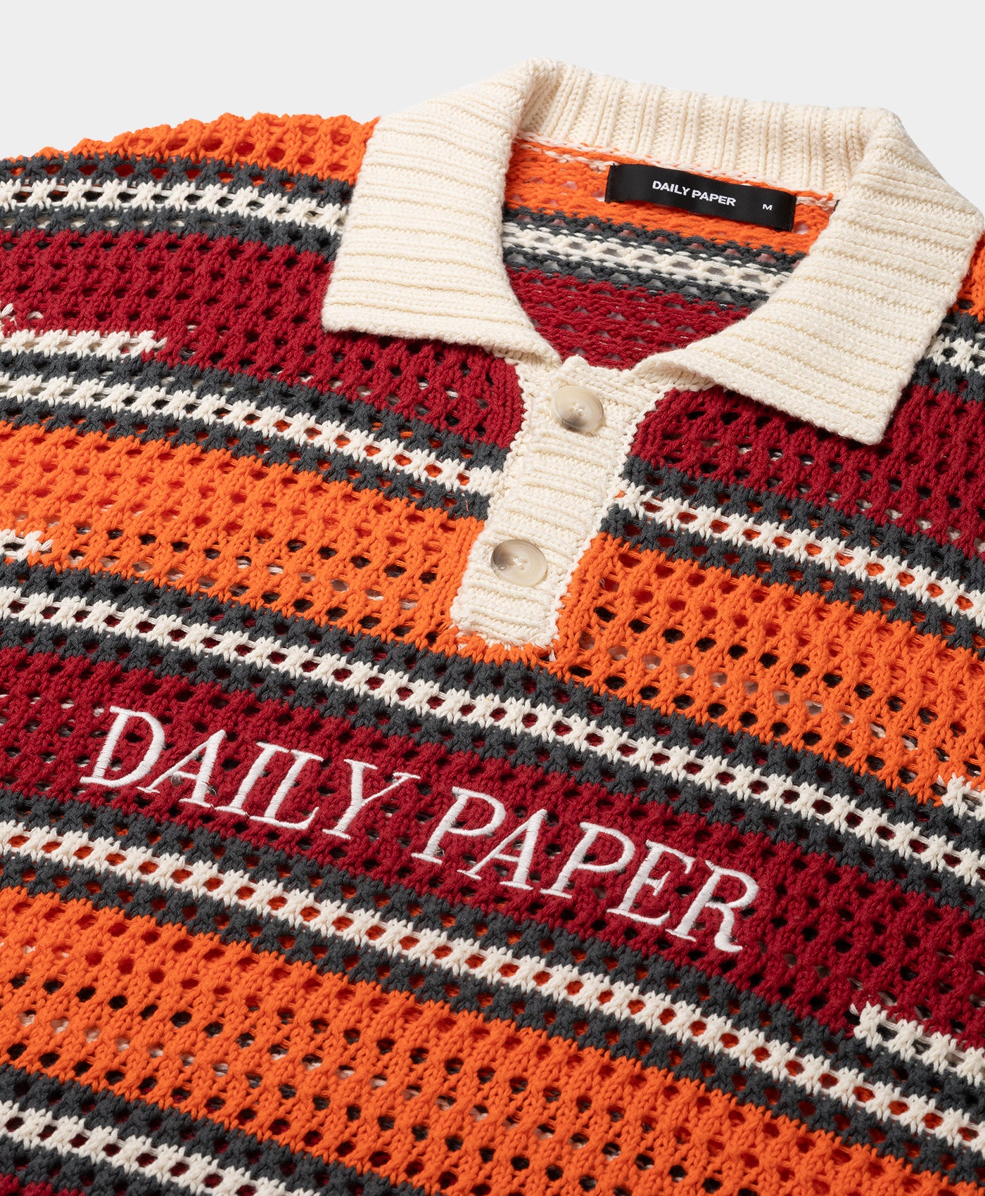 DP - Haute Red Tigerlily Kente Stripe Knit Polo - Packshot - detail
